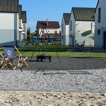Siedlisko na wydmach, sauna,podgrzewane jacuzzi,domki klimatyzowane,starlink internet,parking Dom wakacyjny